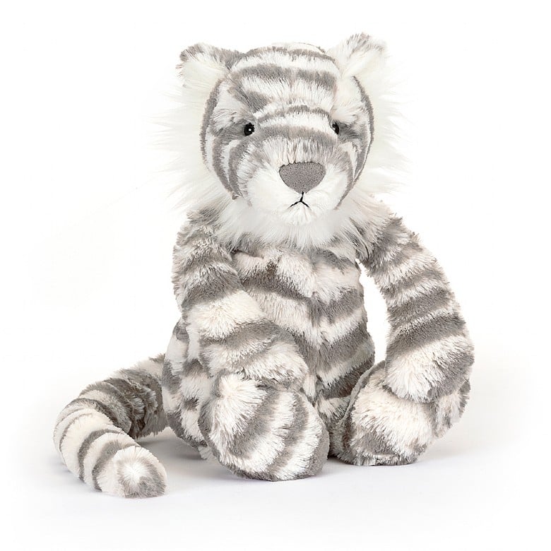 A picture of bashful Snow Tiger soft toy by Jellycat, London.
