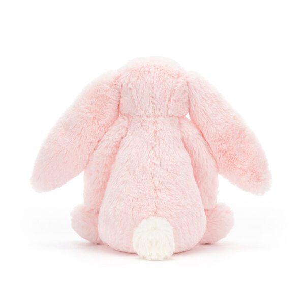 Bashful pink bunny soft toy by Jellycat, back view.