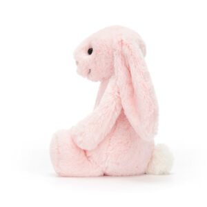 Bashful pink bunny soft toy by Jellycat, side view.