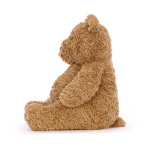 Jellycat Bartholomew Bear soft toy in soft brown, side view.